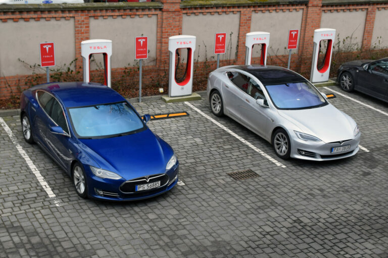 Poznan, Poland - 15th February, 2018: Supercars Tesla Model S parked on the public Tesla Supercharger charging point. Tesla Model S is one of the most popular electric vehicles in Europe.